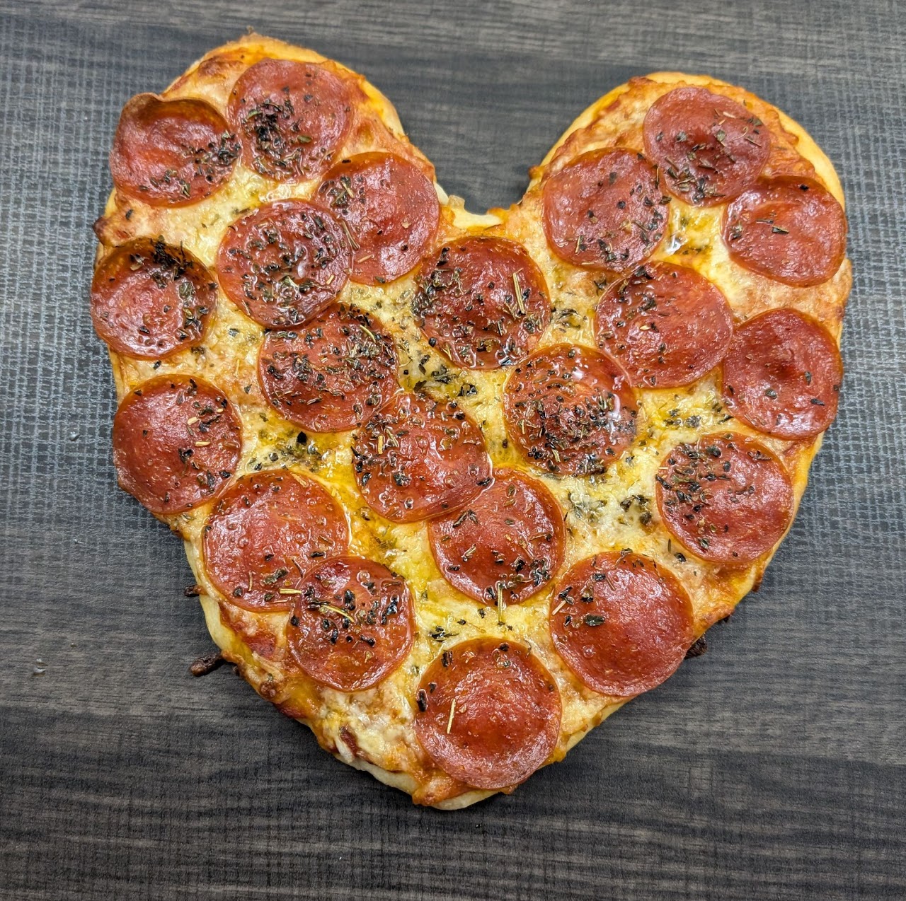 Heart-shaped pepperoni pizza sourdough bake