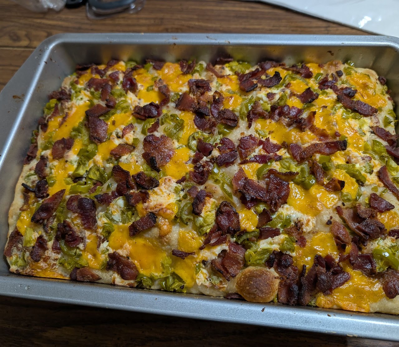 Savory focaccia with cheddar, peppers, and bacon