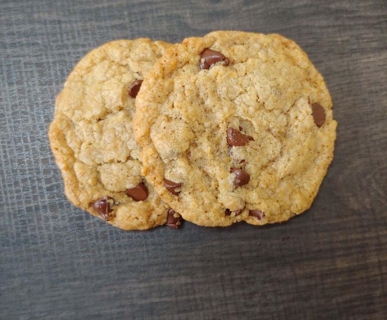 Chocolate chip cookies on a gray wood surface